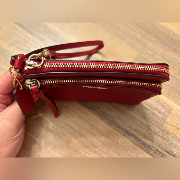 Coach burgundy wallet with gold accents. Wrist strap. Never used. - Picture 4 of 5